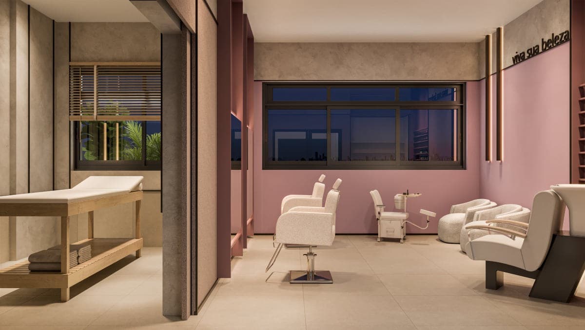 Espaço beauty com cadeiras de corte e lavatórios reclináveis, ao lado da sala de massagem