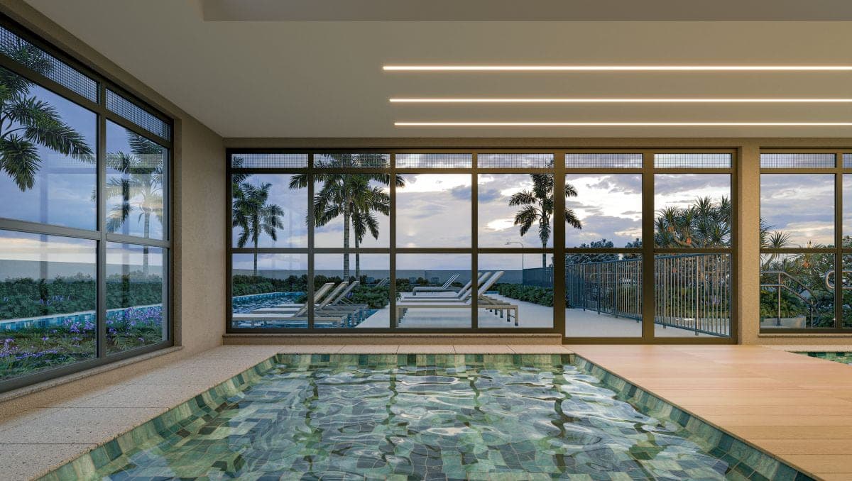 Spa com piscina de imersão revestida em pastilha verde e vidros para o terraço